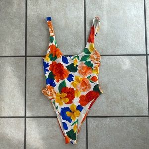 WEWOREWHAT One piece floral swimsuit.